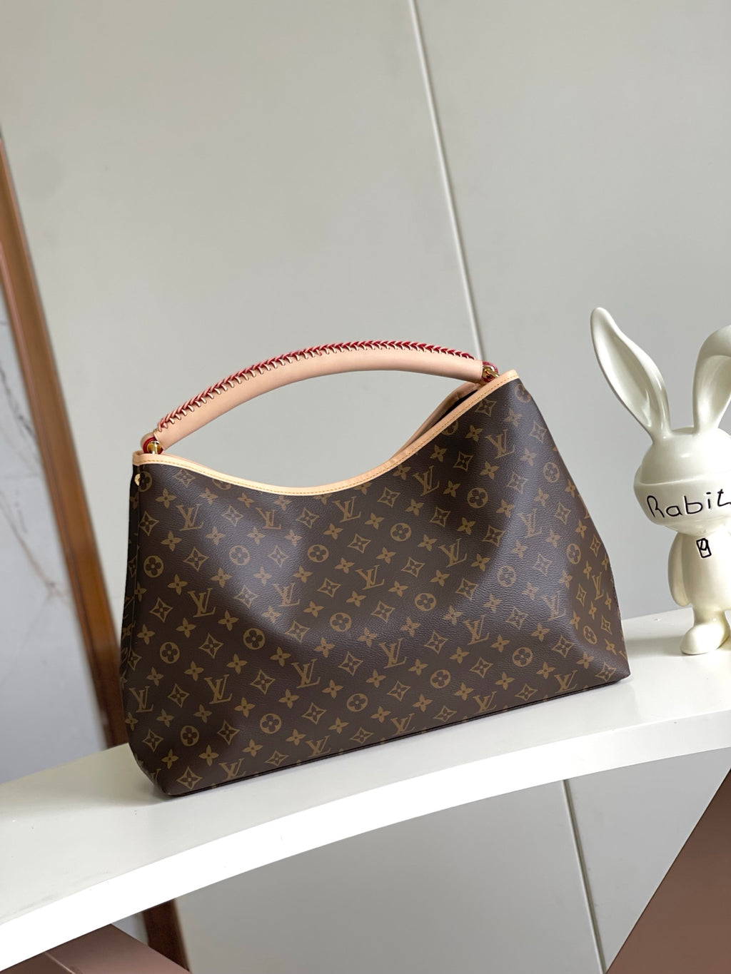 Again Handbag with a classic Monogram canvas base